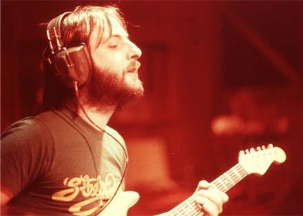 musical influences, elliott randall, music consultant, music coach, music producer, college speaker, loren weisman An image of Elliott Randall with head phones and holding a guitar.