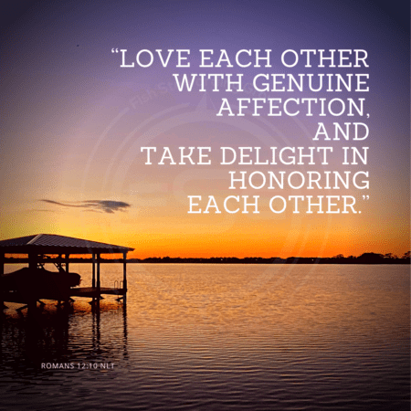 A quote graphic with a background of a purple, orange and light blue sky over a lake and a boat in shadows. In center is an FSG logo watermark and a quote in white text that is credited to Romans 12:10 NLT in a small font on the bottom and in the upper right center the quote reads, “Love each other with genuine affection, and take delight in honoring each other.”