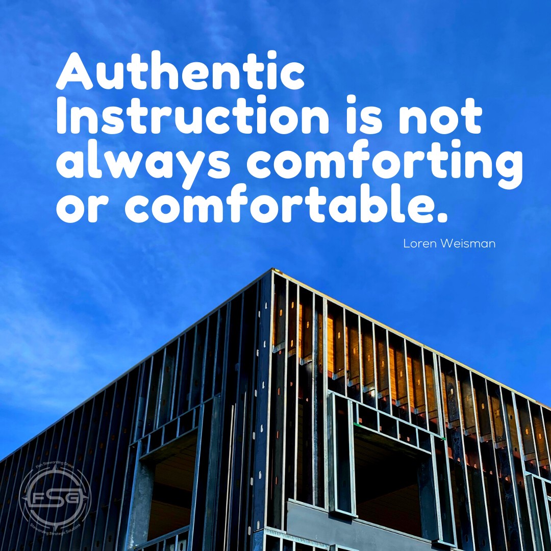 An image of a buildings frame being built with a blue sky on the top and a Loren Weisman quote in white letters that reads Authentic Instruction is not always comforting or comfortable. A small FSG logo in a faded watermark is on the bottom left side of the image.